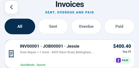 FieldOpsX paid invoice with QuickBooks synced status